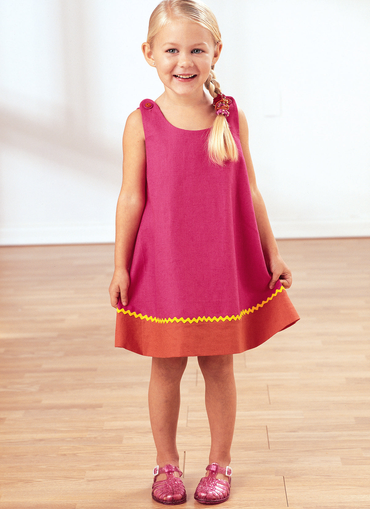 Butterick B3772 sewing pattern envelope showing the toddler dress designs