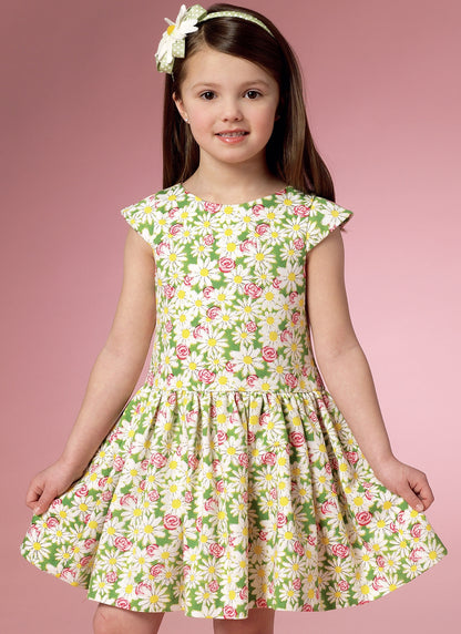 Butterick B6201 sewing pattern envelope showing girls' dress designs