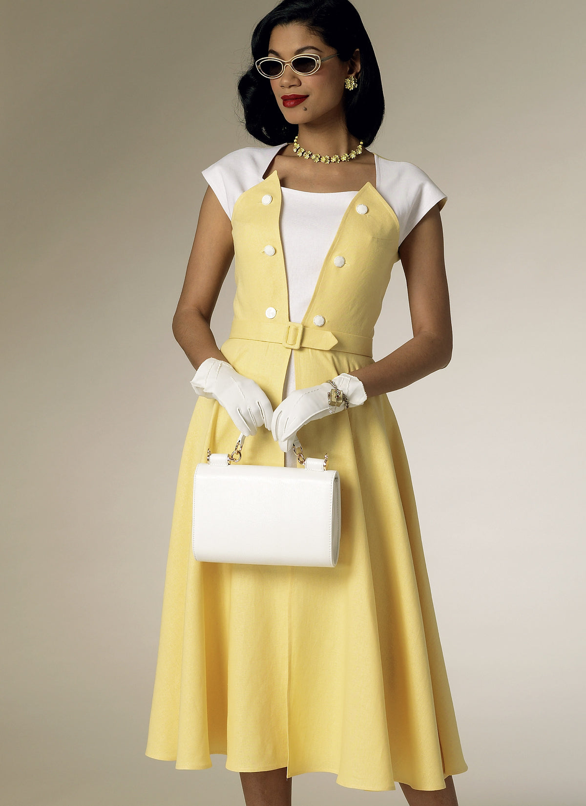 Butterick B6211 sewing pattern envelope showing women's front wrap dress designs
