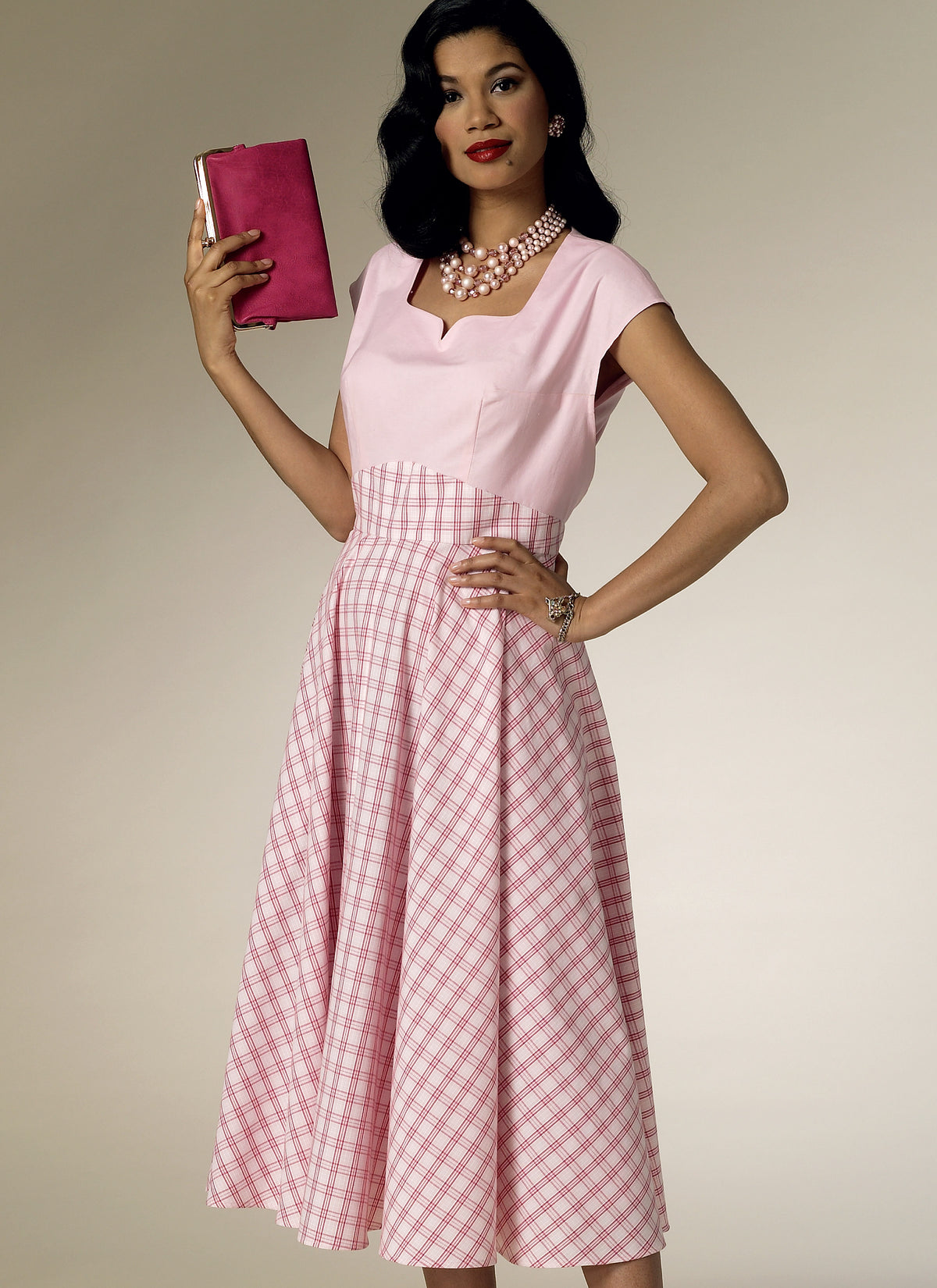 Butterick B6212 sewing pattern envelope showing women's back wrap dress designs