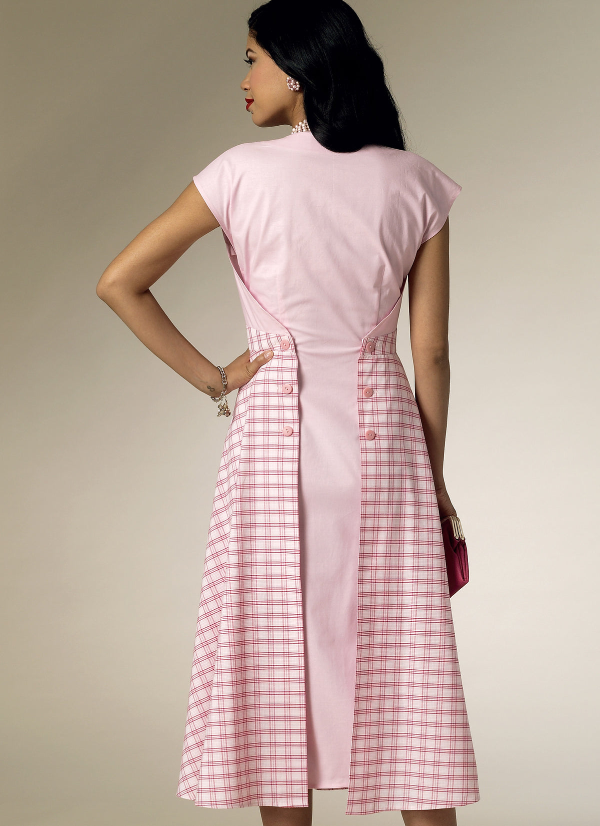 Butterick B6212 sewing pattern envelope showing women's back wrap dress designs