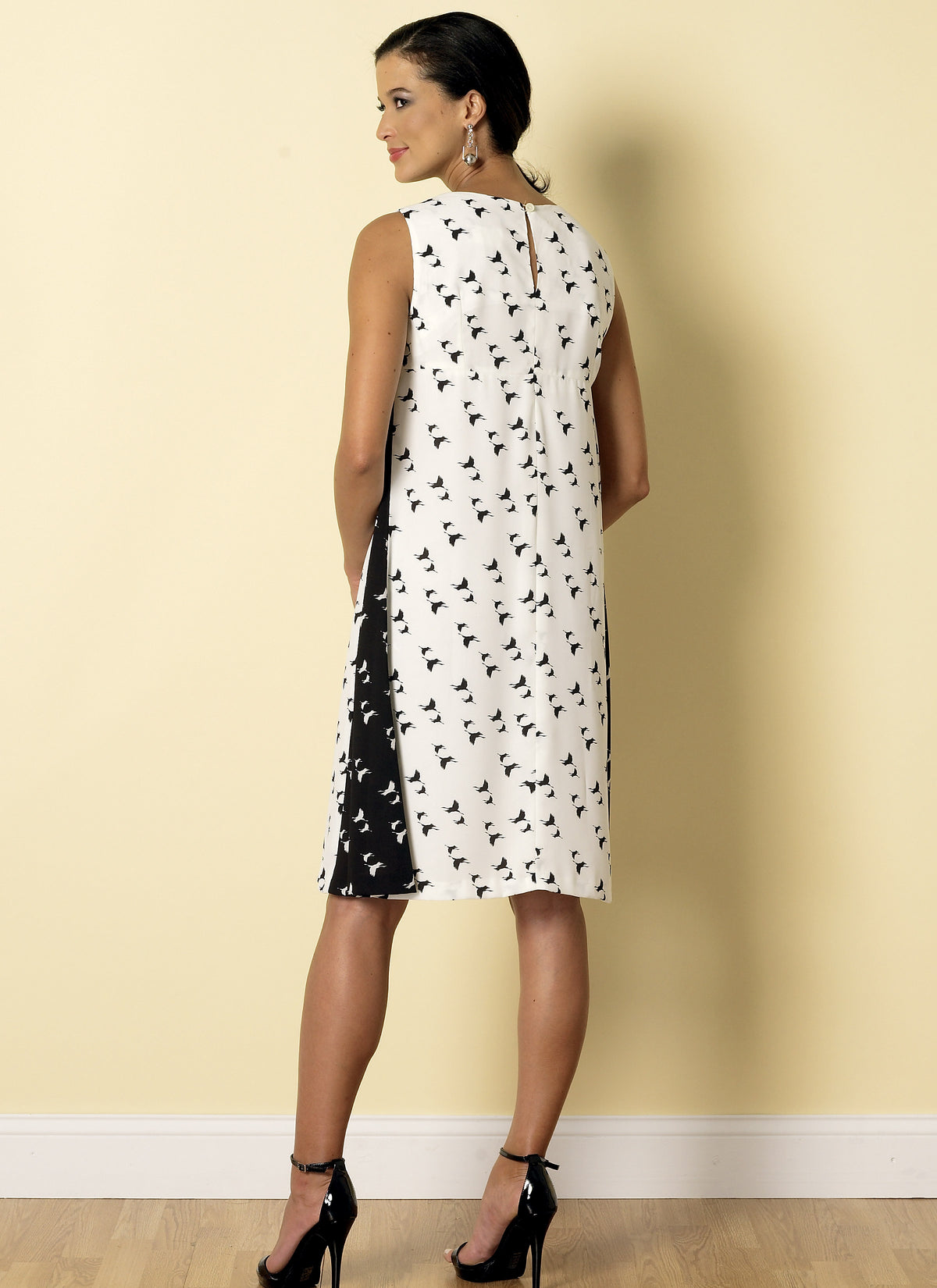 Butterick B6317 sewing pattern envelope showing women's v-neck pullover dress designs