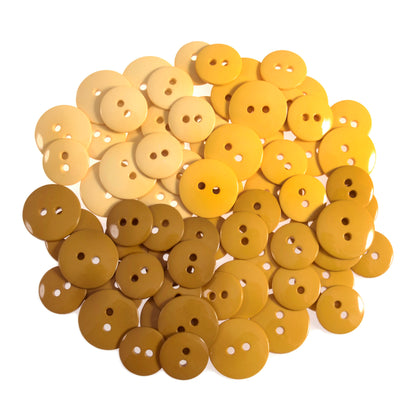 Pack of yellow nylon craft buttons in mixed shades and sizes