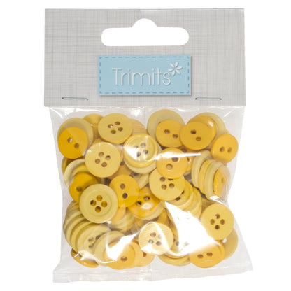 Pile of small yellow craft buttons