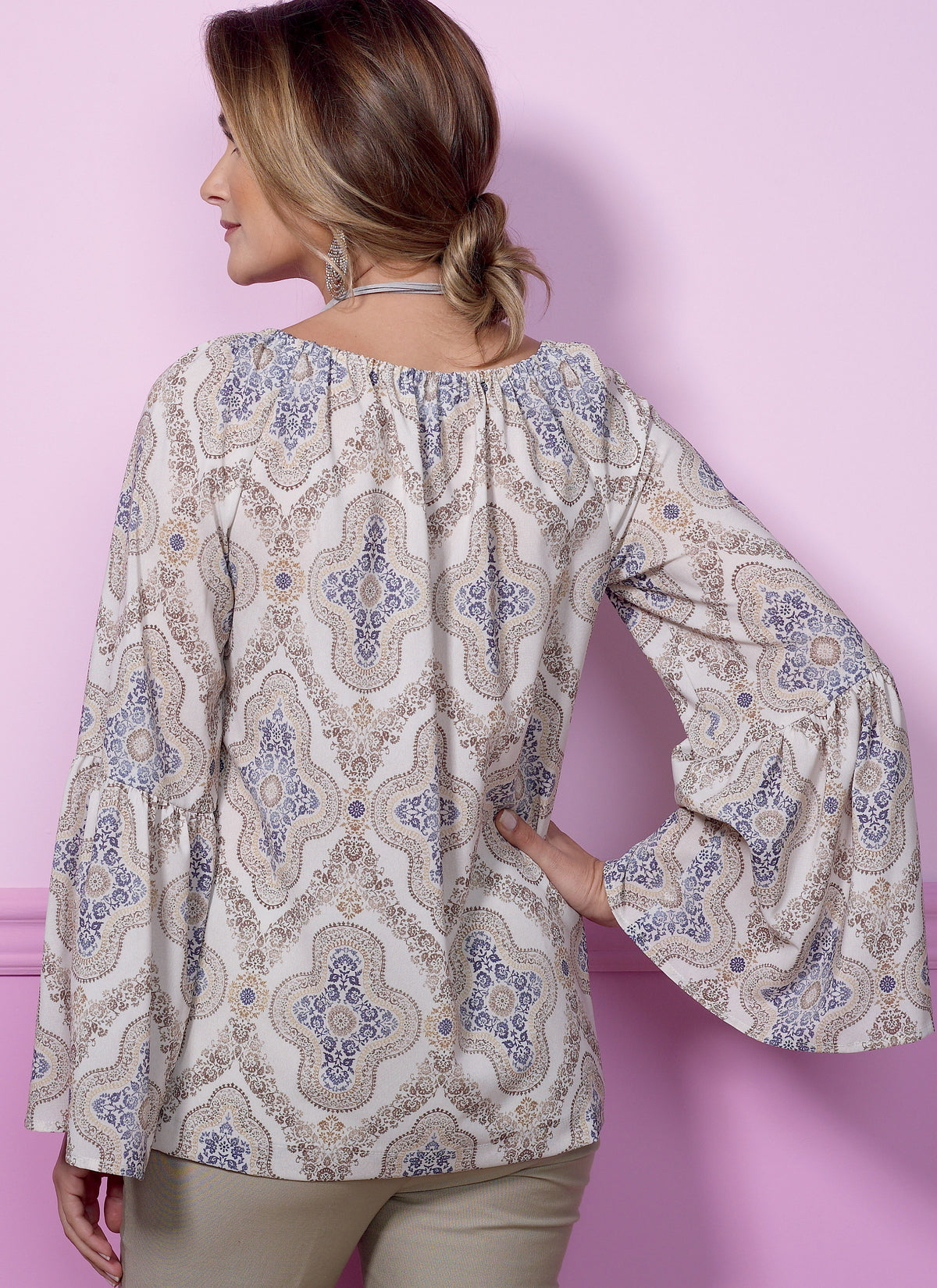 Butterick B6455 sewing pattern envelope showing misses pullover top designs