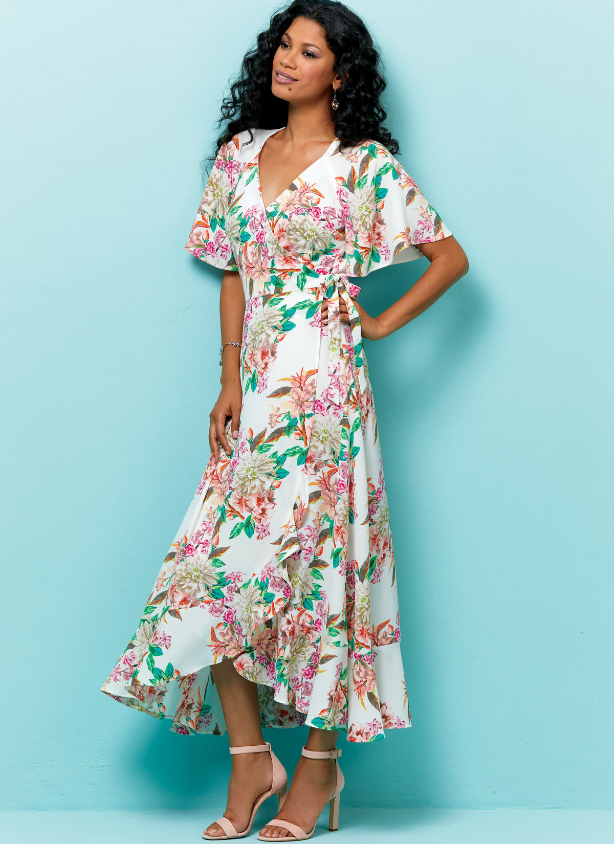 Butterick B6554 sewing pattern envelope showing misses wrap dress designs