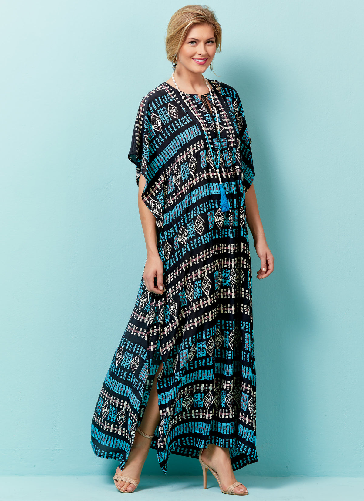 Butterick B6559 sewing pattern envelope showing misses tops, tunic and caftan designs