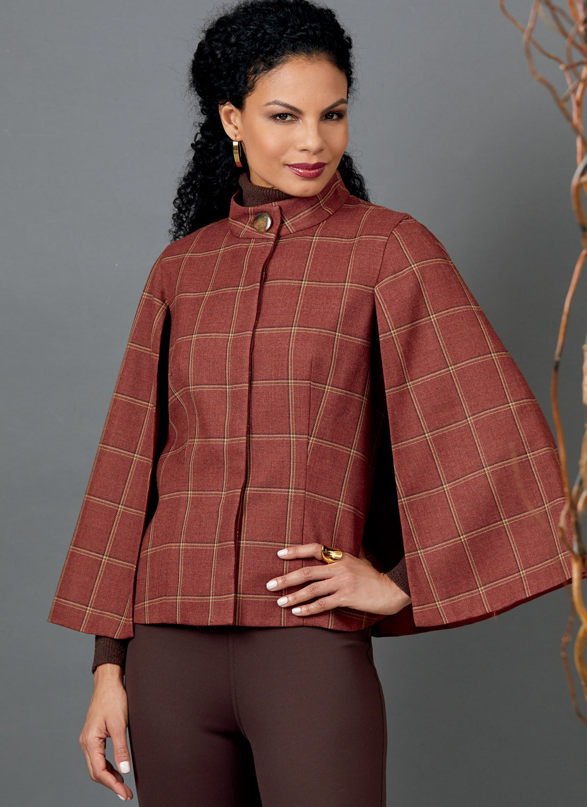 Butterick B6603 sewing pattern envelope showing misses lined cape designs