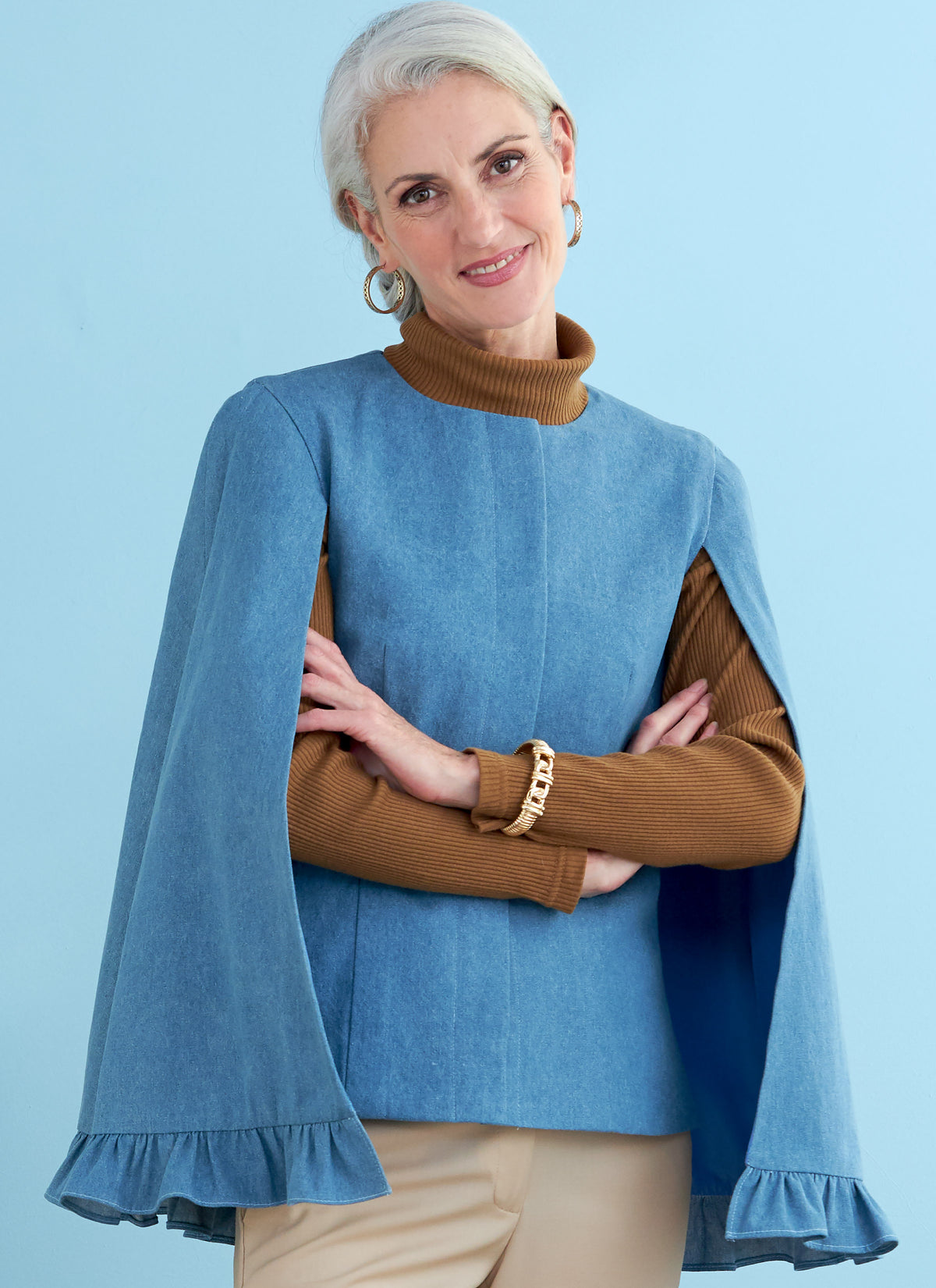 Butterick B6603 sewing pattern envelope showing misses lined cape designs