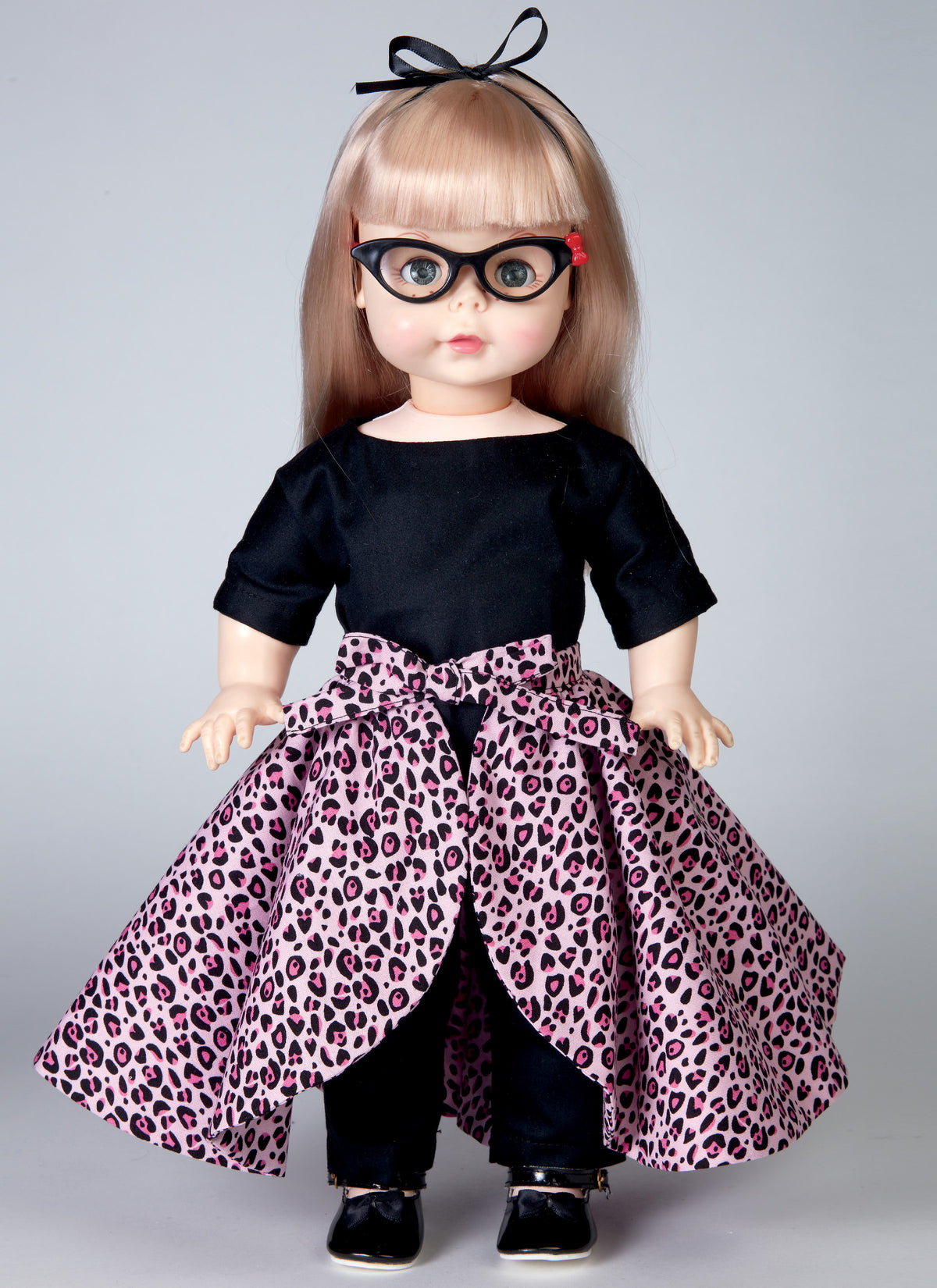Butterick B6606 sewing pattern envelope showing doll clothes designs