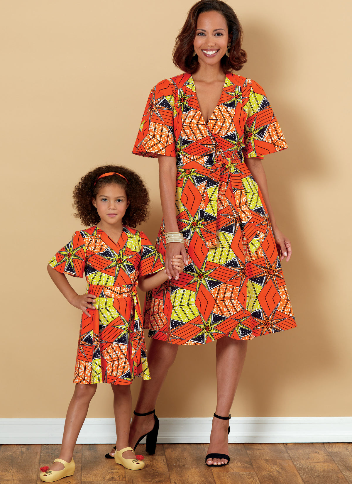 Butterick B6654 sewing pattern envelope showing misses wrap dress designs