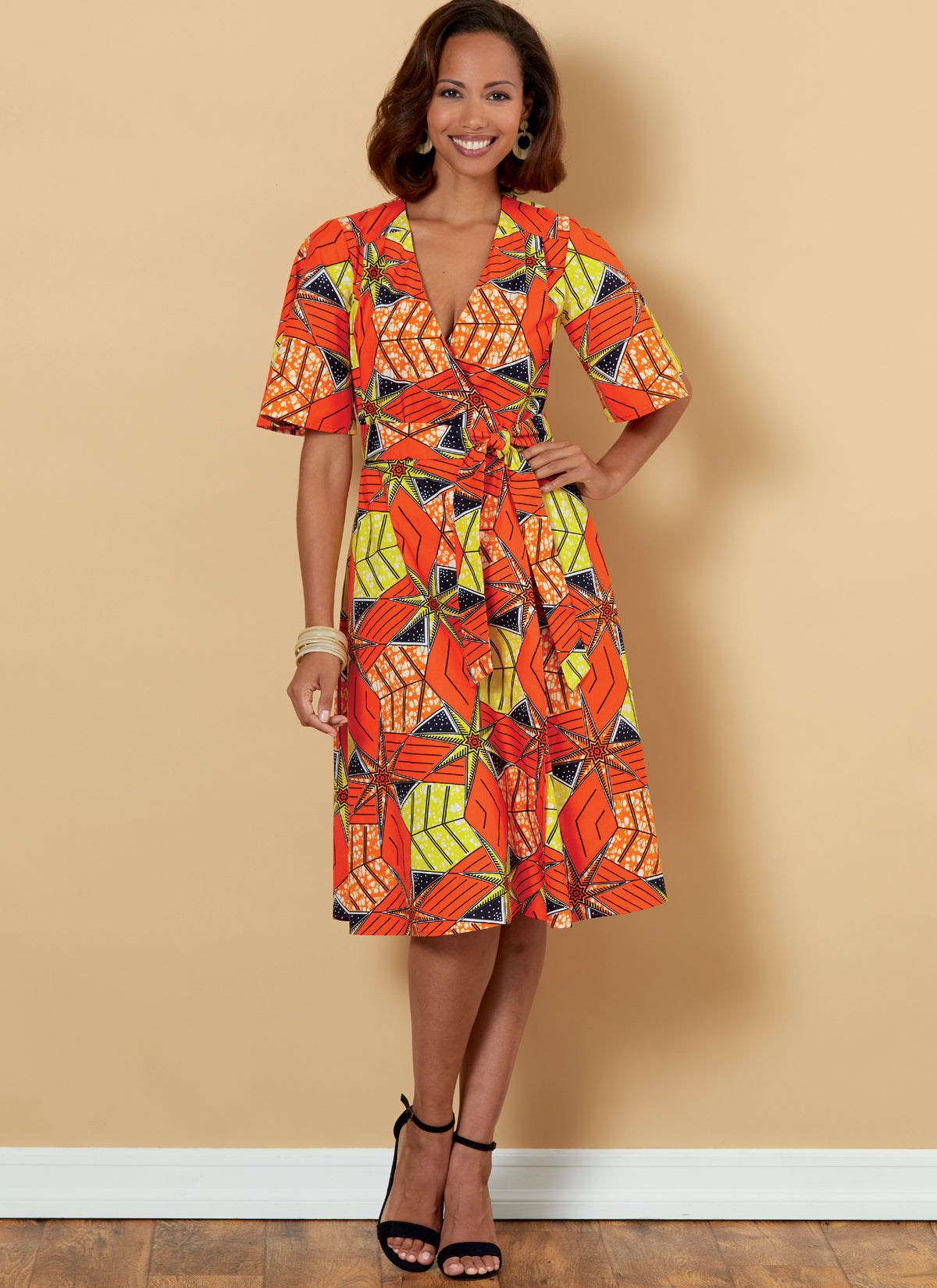 Butterick B6654 sewing pattern envelope showing misses wrap dress designs
