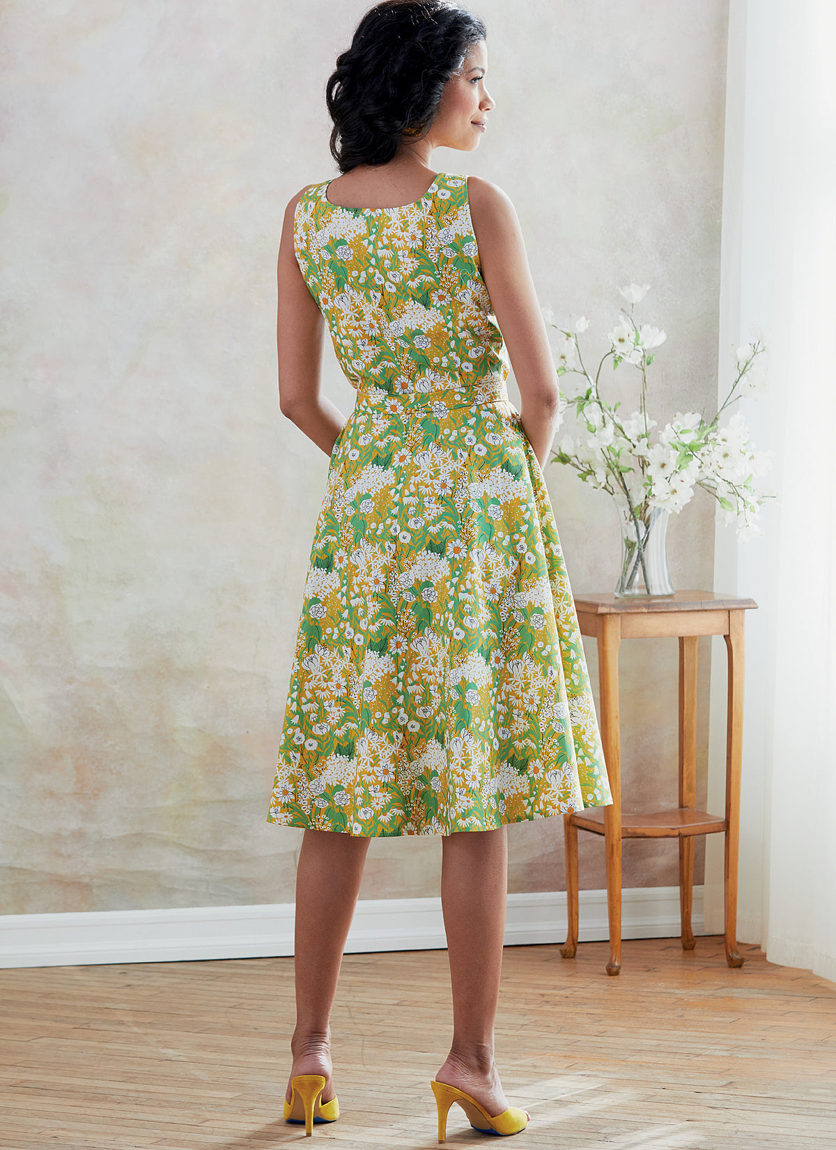 Butterick B6674 sewing pattern envelope showing a close-fitting dress with a sash