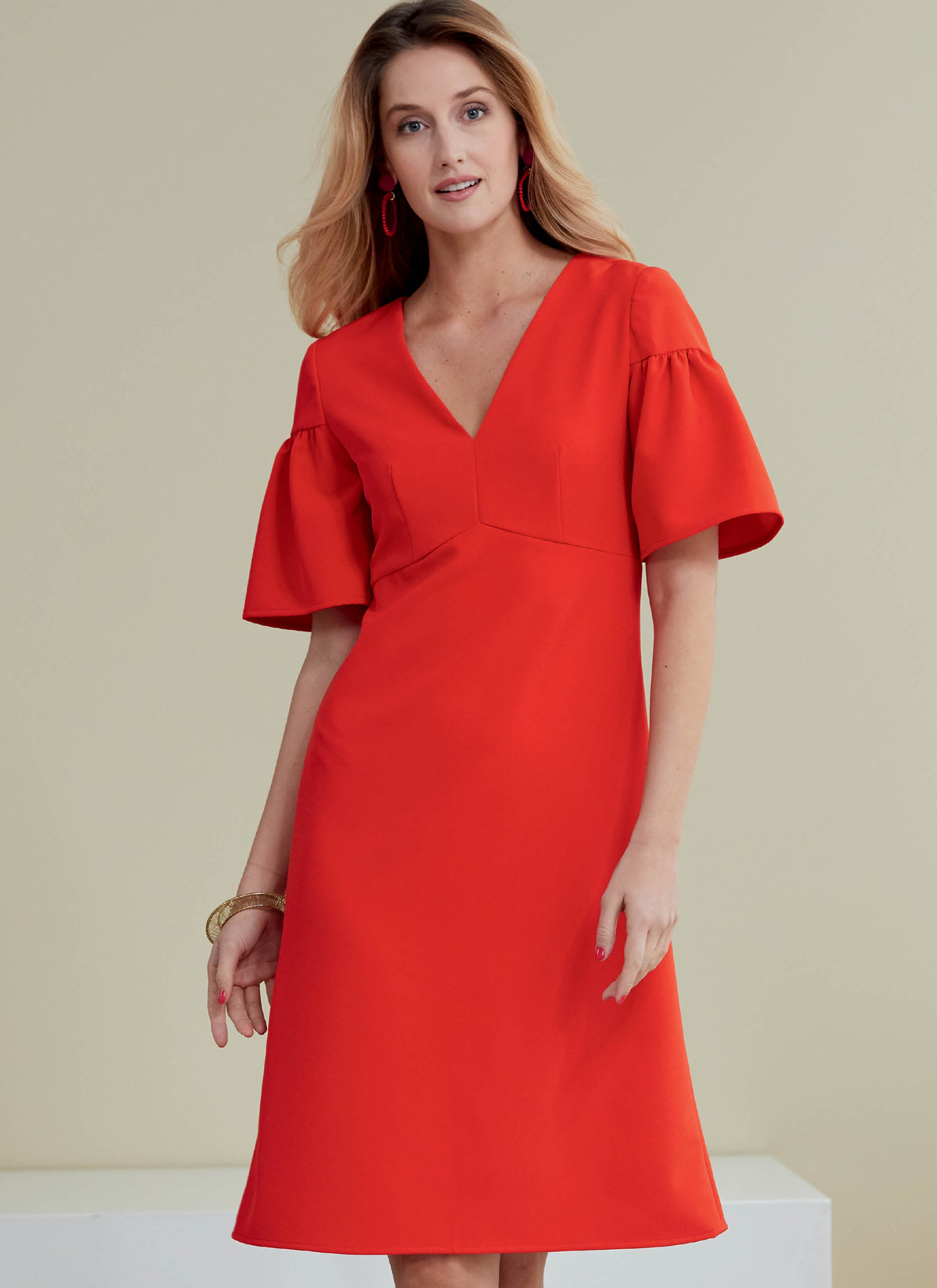 Butterick B6678 sewing pattern envelope showing an unlined dress, close fitting through the bust