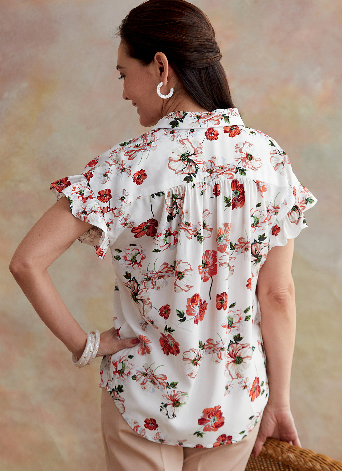 Butterick B6686 sewing pattern envelope showing semi-fitted button-front tops