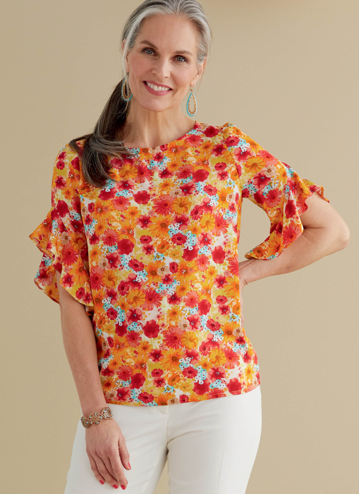 Butterick B6687 sewing pattern envelope showing a semi-fitted top