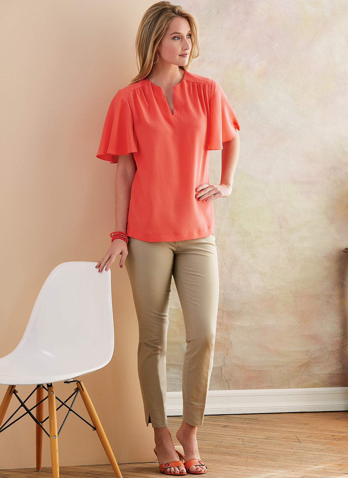 Butterick B6688 sewing pattern envelope showing a semi-fitted top with a self-faced yoke