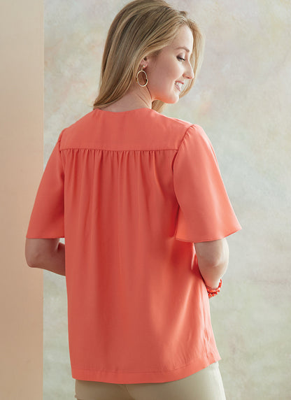 Butterick B6688 sewing pattern envelope showing a semi-fitted top with a self-faced yoke