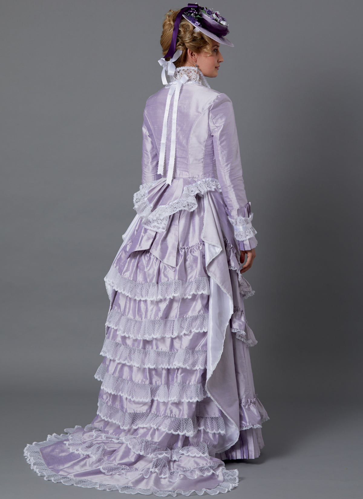 Butterick B6692 sewing pattern envelope showing a fitted button-front jacket and skirt costume