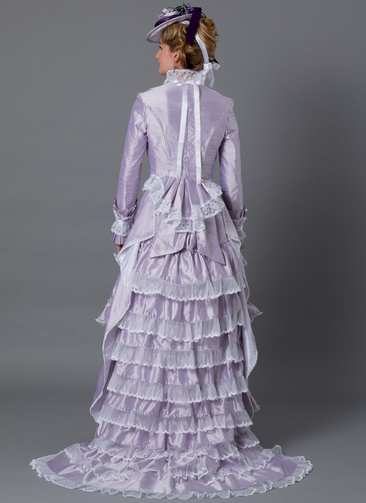 Butterick B6692 sewing pattern envelope showing a fitted button-front jacket and skirt costume