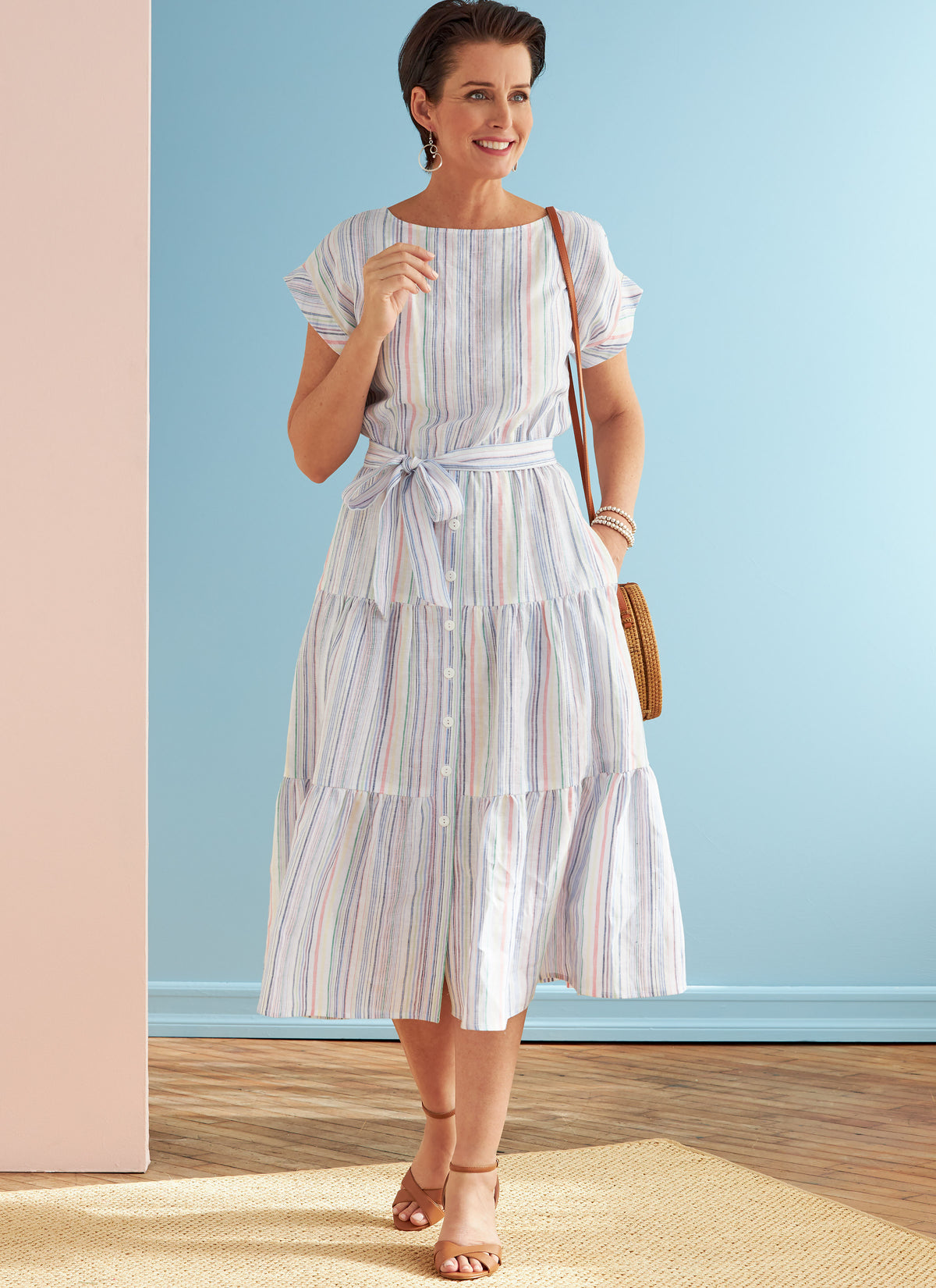 Butterick B6722 sewing pattern envelope showing a loose-fitting tiered dress with an elastic waist