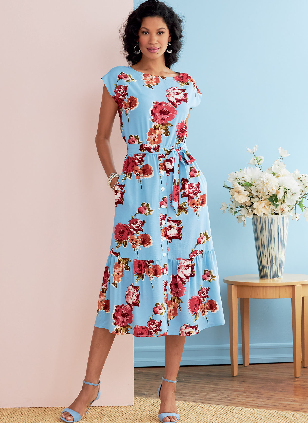 Butterick B6722 sewing pattern envelope showing a loose-fitting tiered dress with an elastic waist