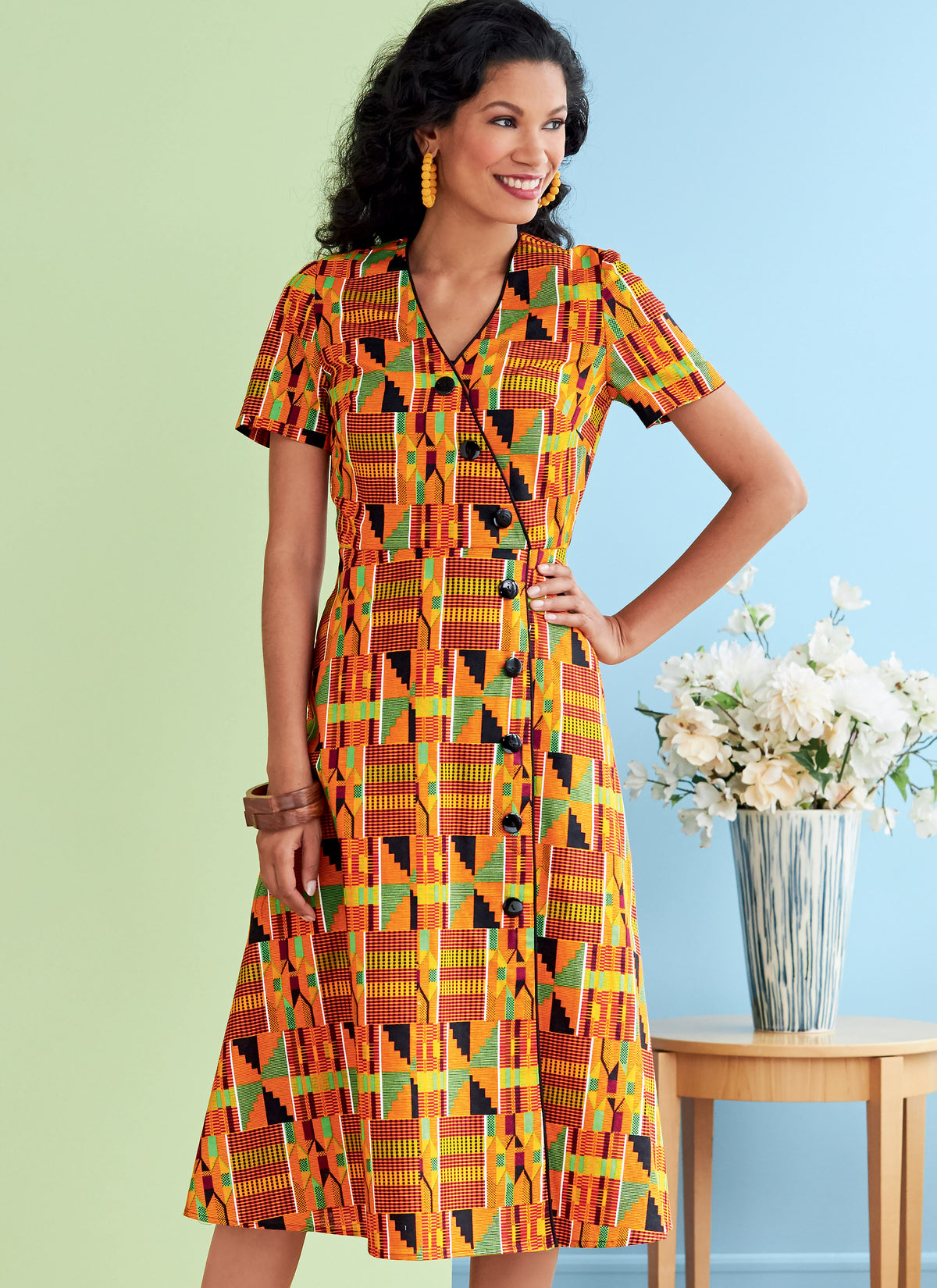 Butterick B6727 sewing pattern envelope showing a mock button-front dress
