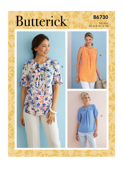 Butterick B6730 sewing pattern envelope showing tops with front neckline tucks