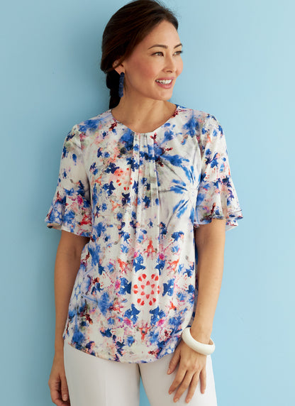 Butterick B6730 sewing pattern envelope showing tops with front neckline tucks