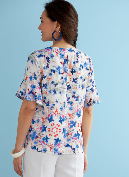Butterick B6730 sewing pattern envelope showing tops with front neckline tucks