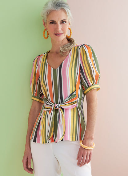 Butterick B6731 sewing pattern envelope showing V-neck tops with front ties