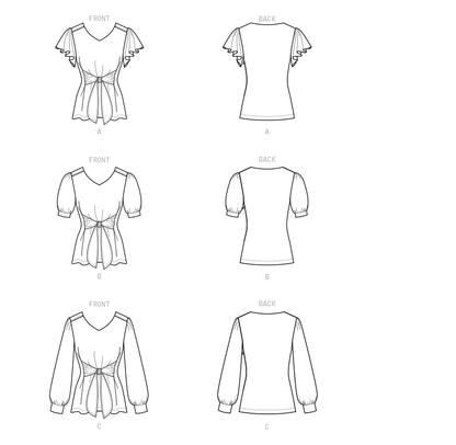 Butterick B6731 sewing pattern envelope showing V-neck tops with front ties