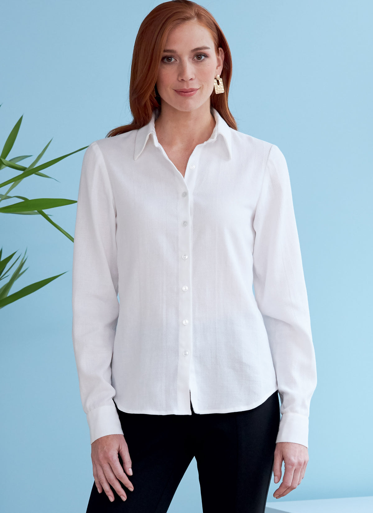 Butterick B6747 sewing pattern envelope showing misses' fitted shirts designs