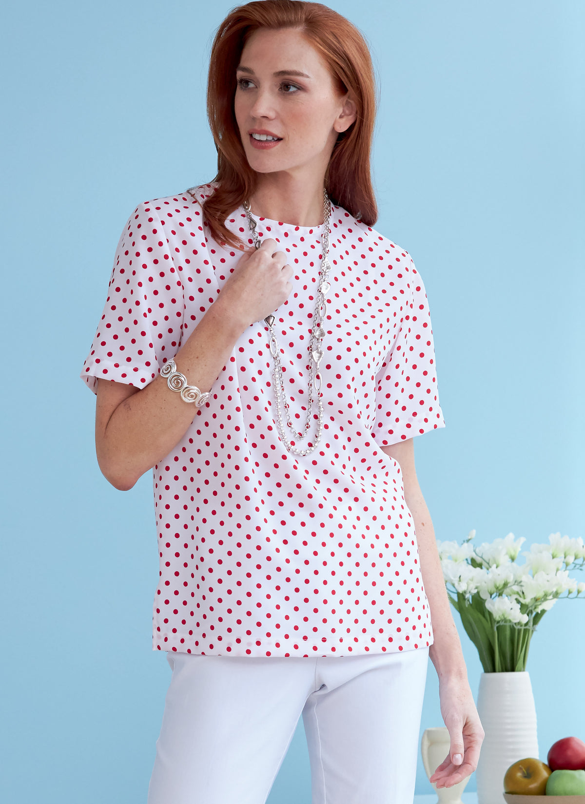 Butterick B6751 sewing pattern envelope showing misses' pullover top designs