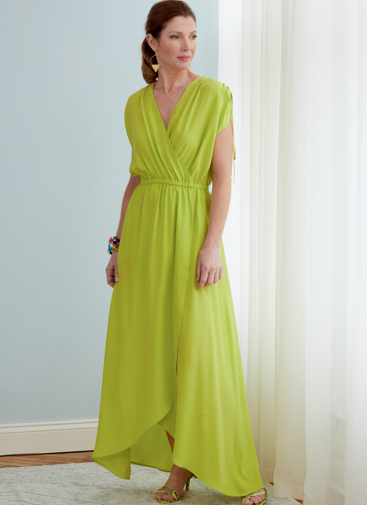 Butterick B6756 sewing pattern envelope showing misses' faux-wrap dress and jumpsuit designs