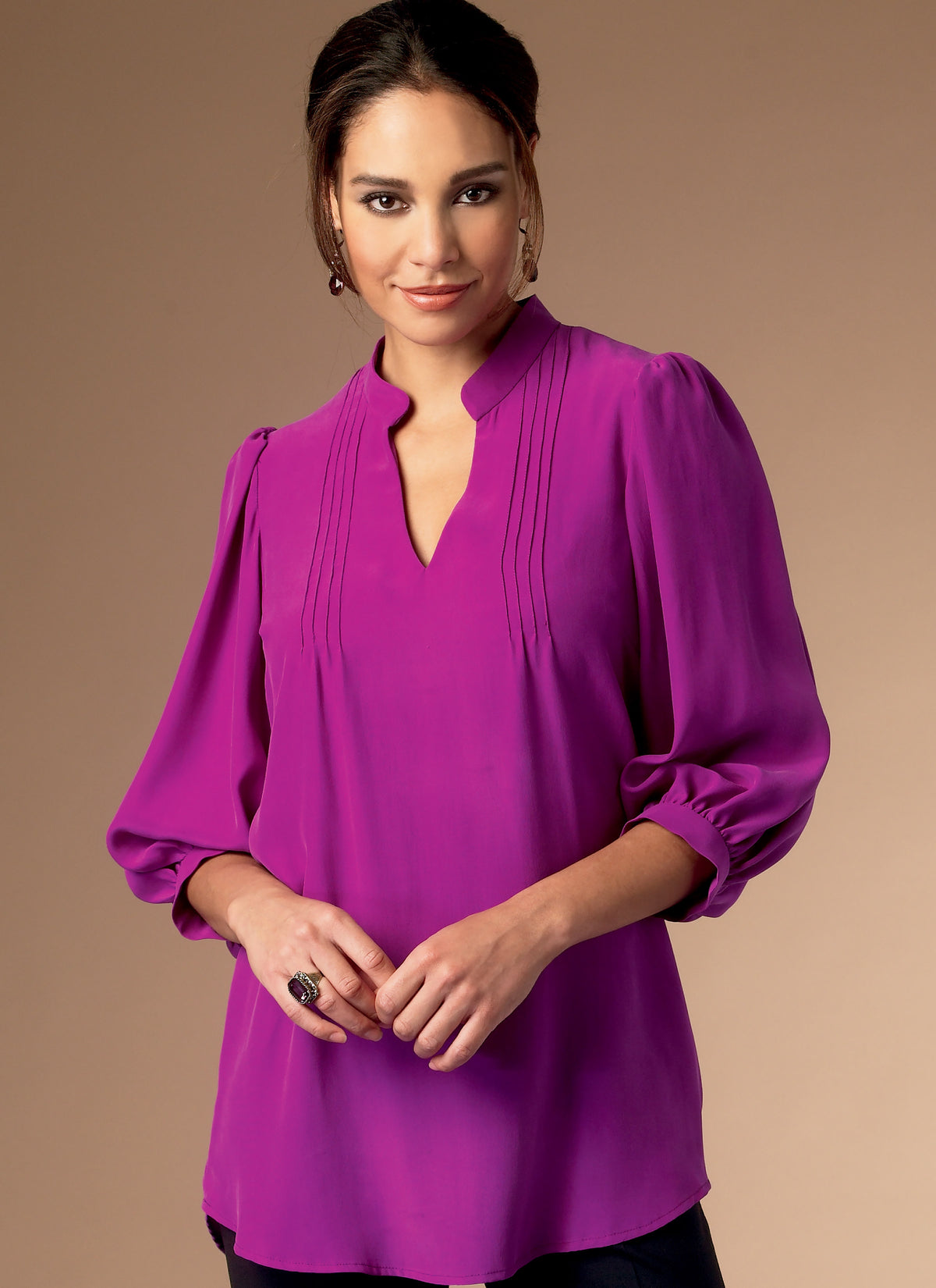 Butterick B6801 sewing pattern envelope showing women's loose pullover top designs