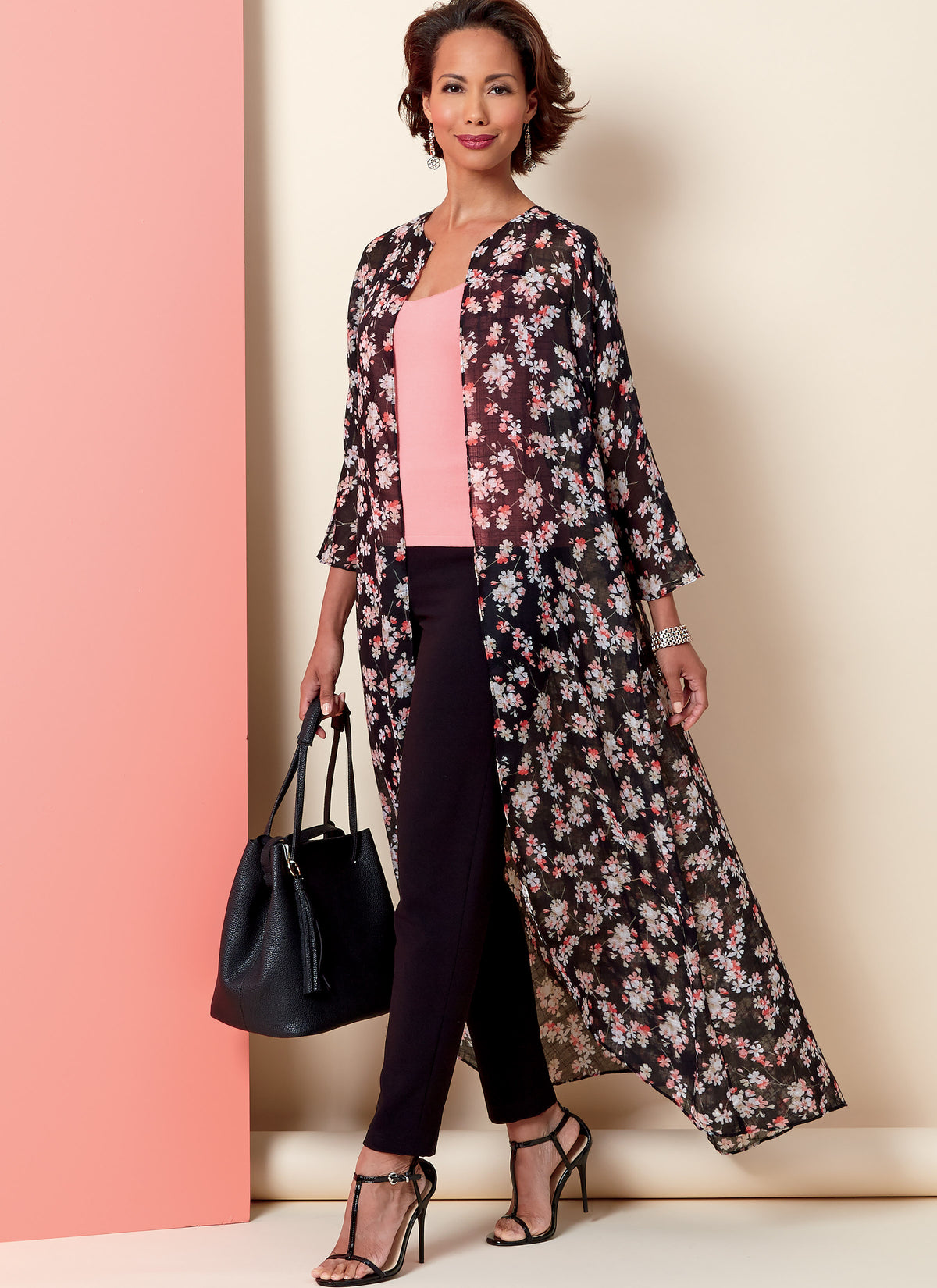 Butterick B6802 sewing pattern envelope showing women's loose fitting jacket designs