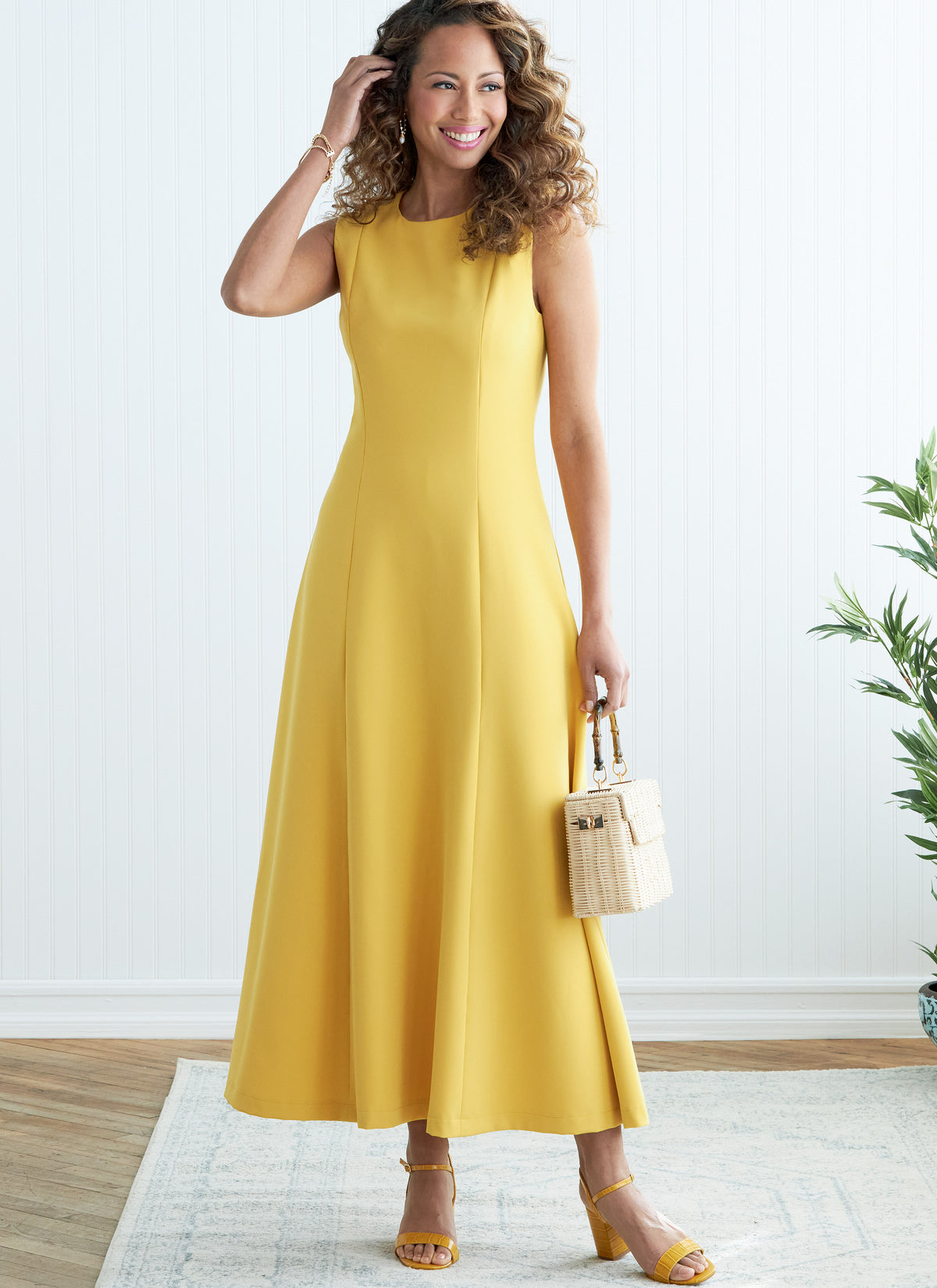 Butterick B6850 sewing pattern envelope showing women's princess seam dress designs