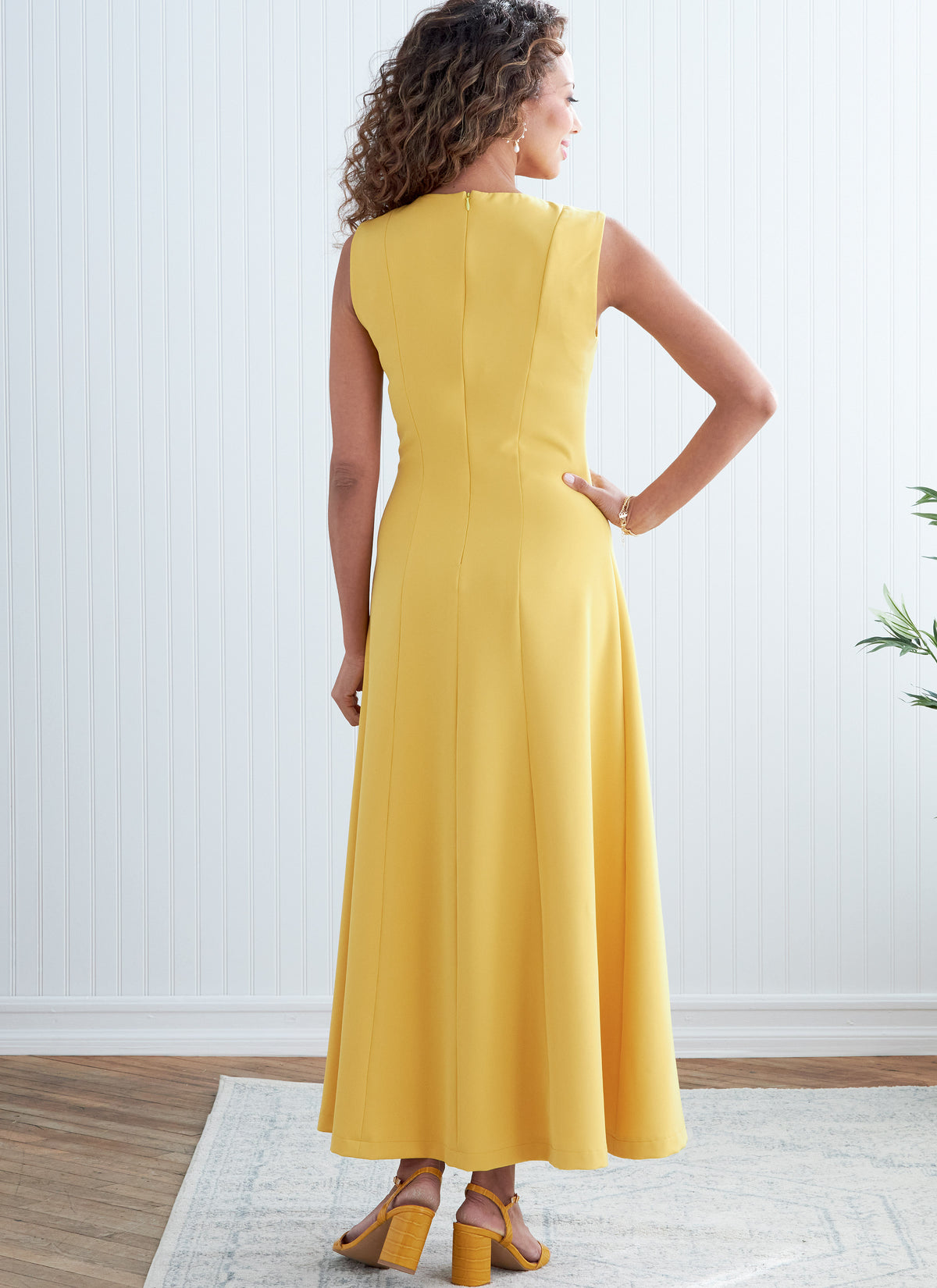 Butterick B6850 sewing pattern envelope showing women's princess seam dress designs