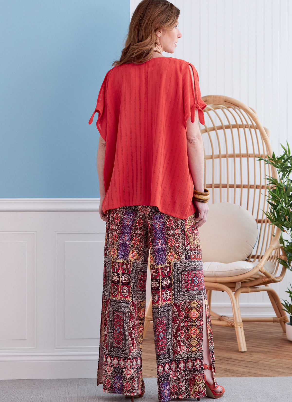 Butterick B6853 sewing pattern envelope showing women's loose tunic & dress designs