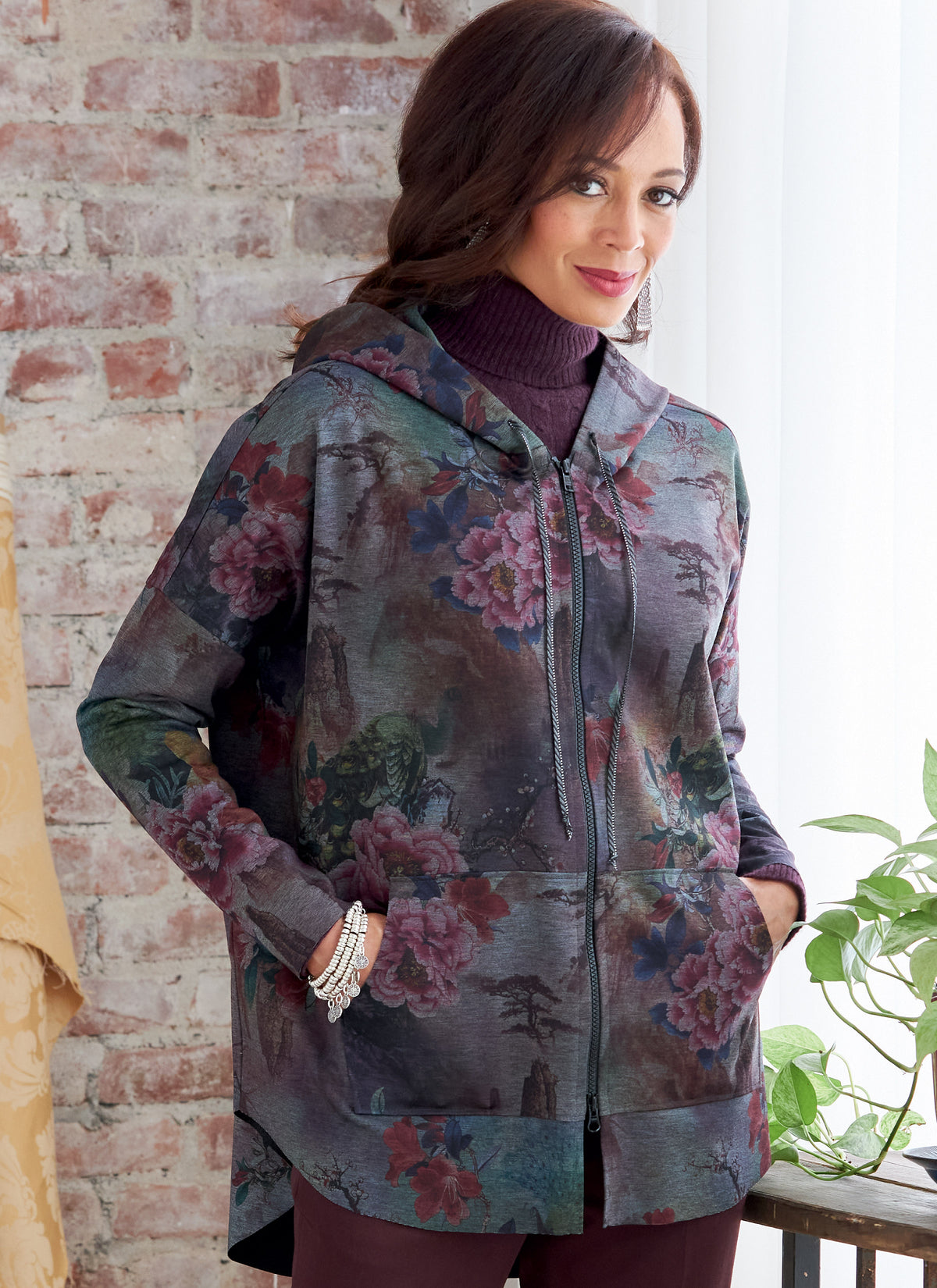 Butterick B6863 sewing pattern envelope showing misses' zip front hooded jacket designs