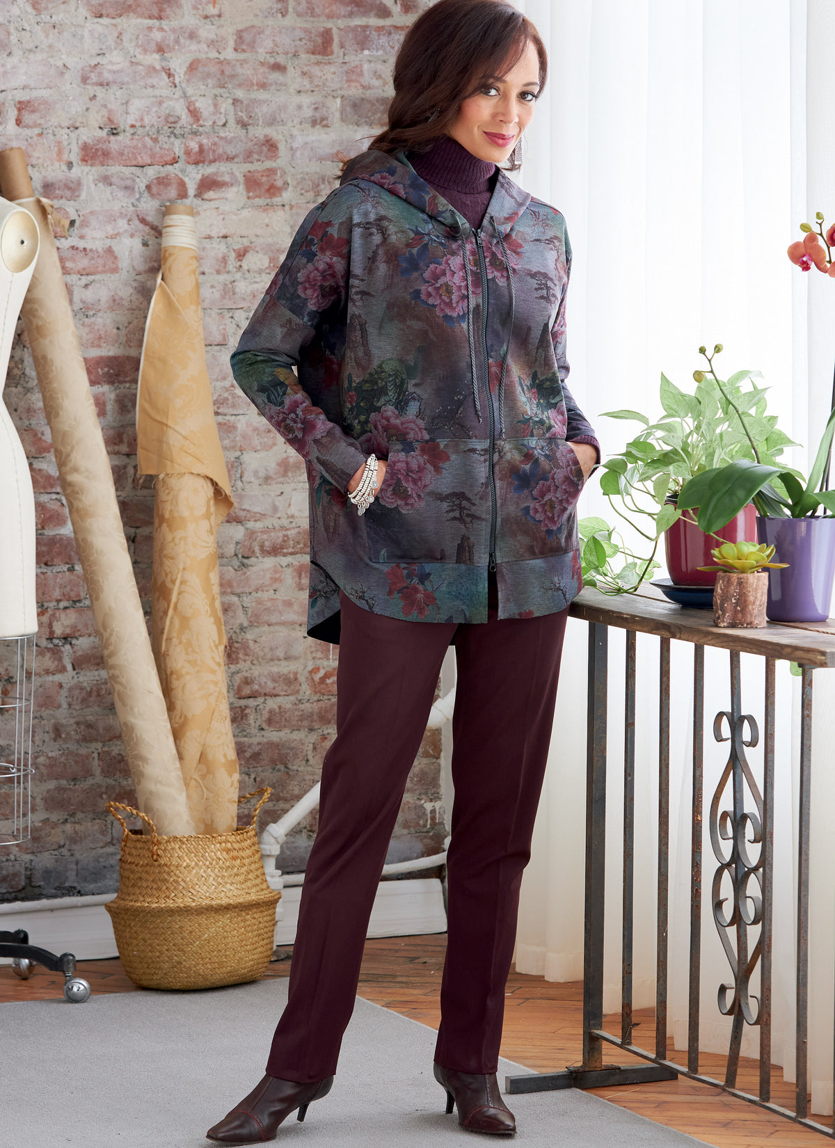 Butterick B6863 sewing pattern envelope showing misses' zip front hooded jacket designs