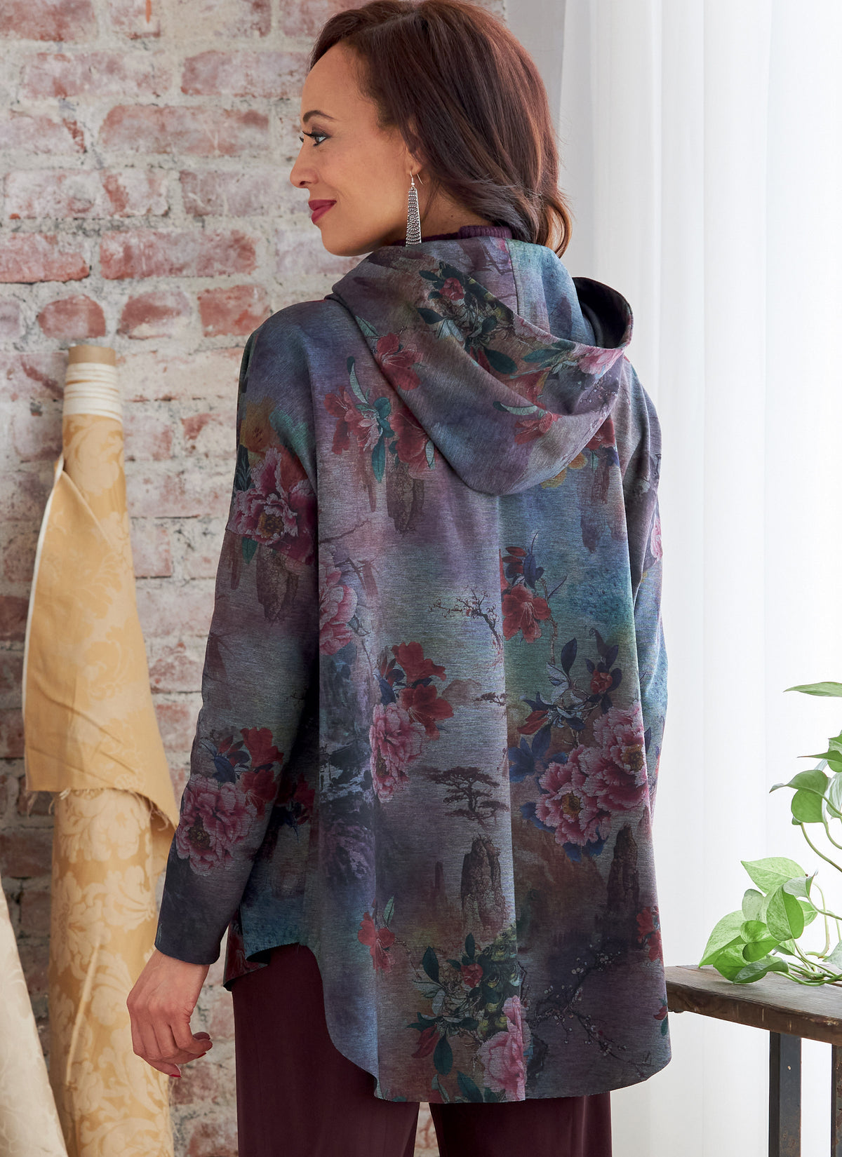 Butterick B6863 sewing pattern envelope showing misses' zip front hooded jacket designs