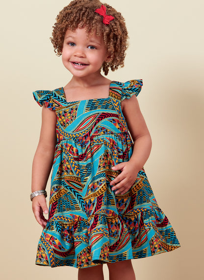 Butterick B6885 sewing pattern envelope showing toddler high waist dress designs