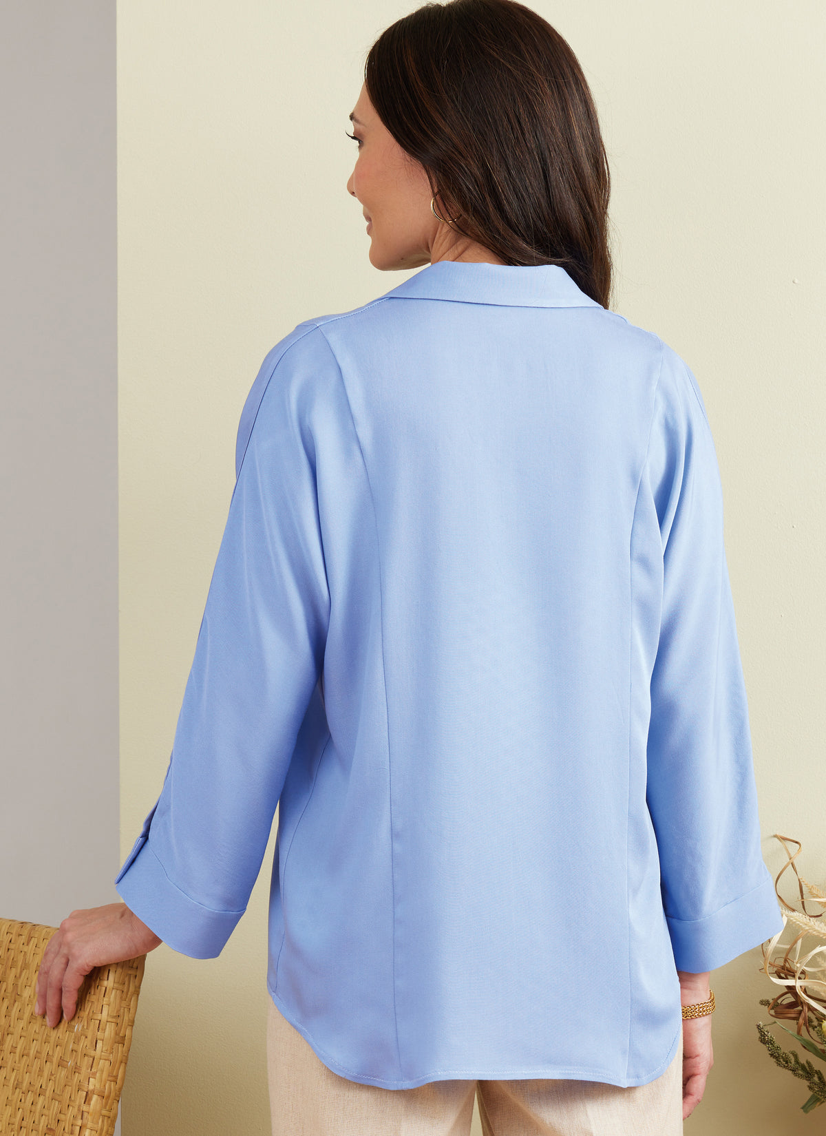 Butterick B6898 sewing pattern envelope showing the button front princess seam top designs