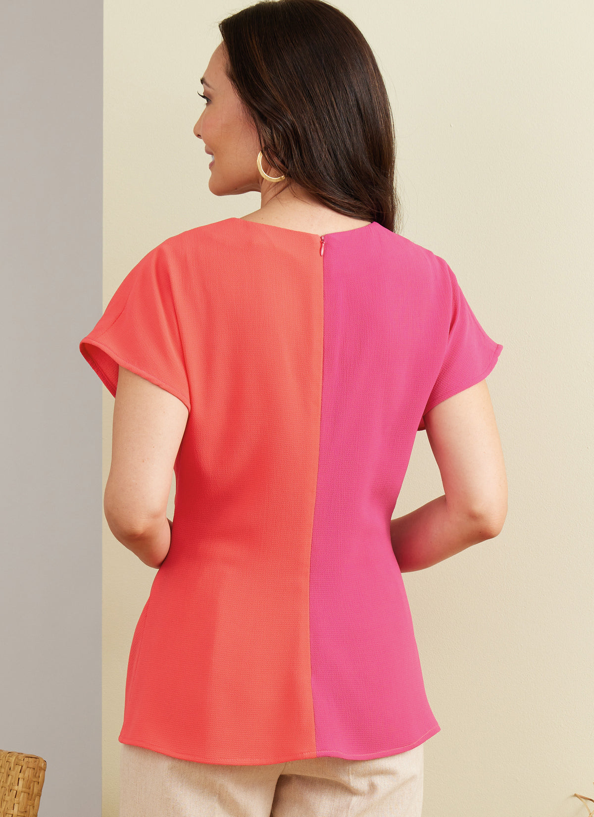 Butterick B6899 sewing pattern envelope showing the twist front short sleeve top designs