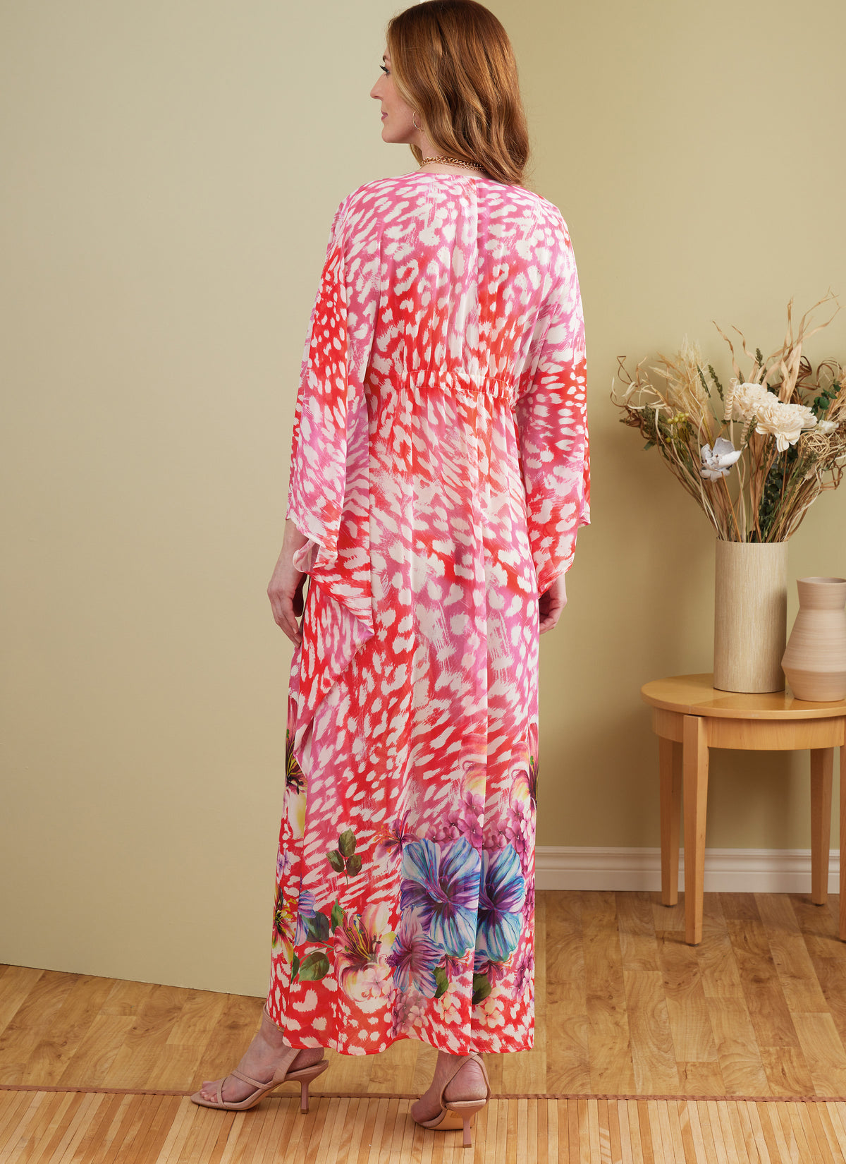 Butterick B6900 sewing pattern envelope showing the v-neck kaftan dress designs