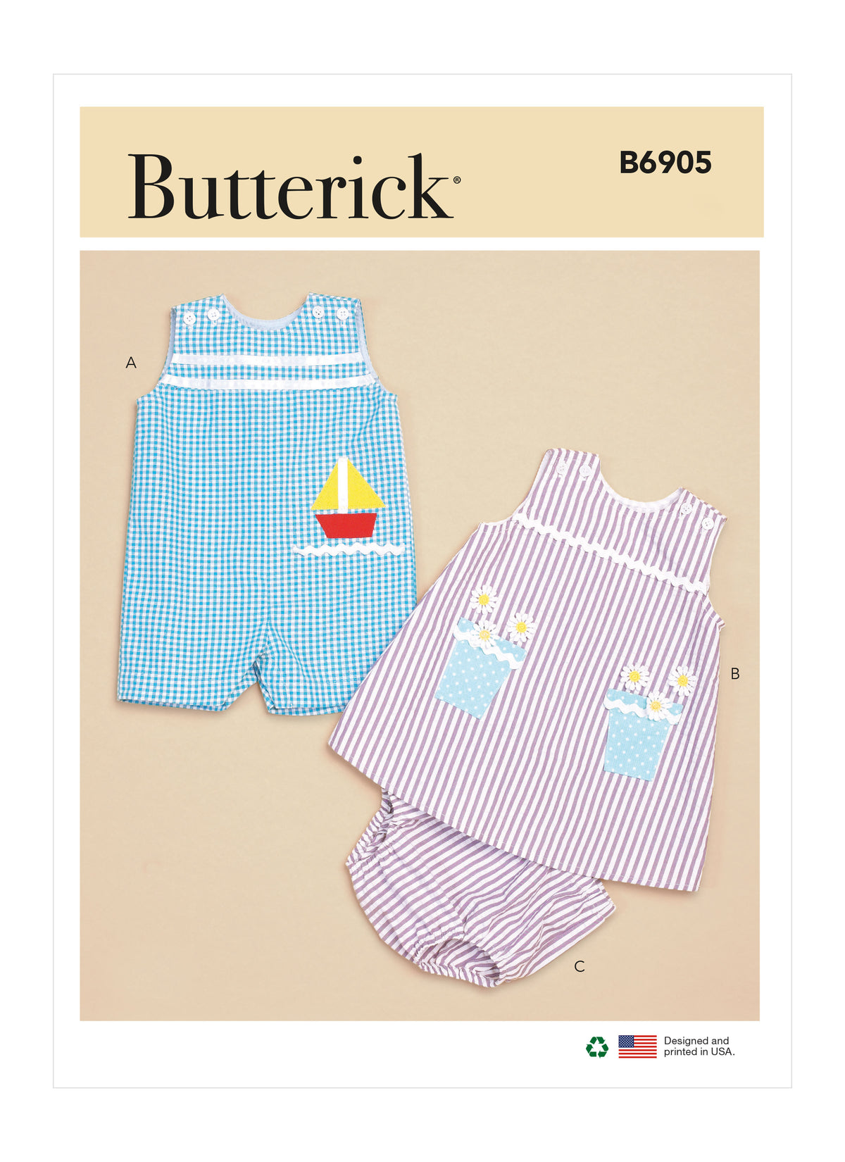 Butterick B6905 sewing pattern envelope showing the baby overalls, dress and knickers designs
