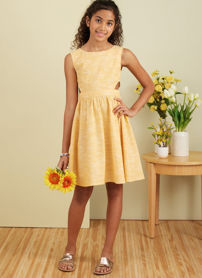 Butterick B6908 sewing pattern envelope showing the girls' full skirt dress designs