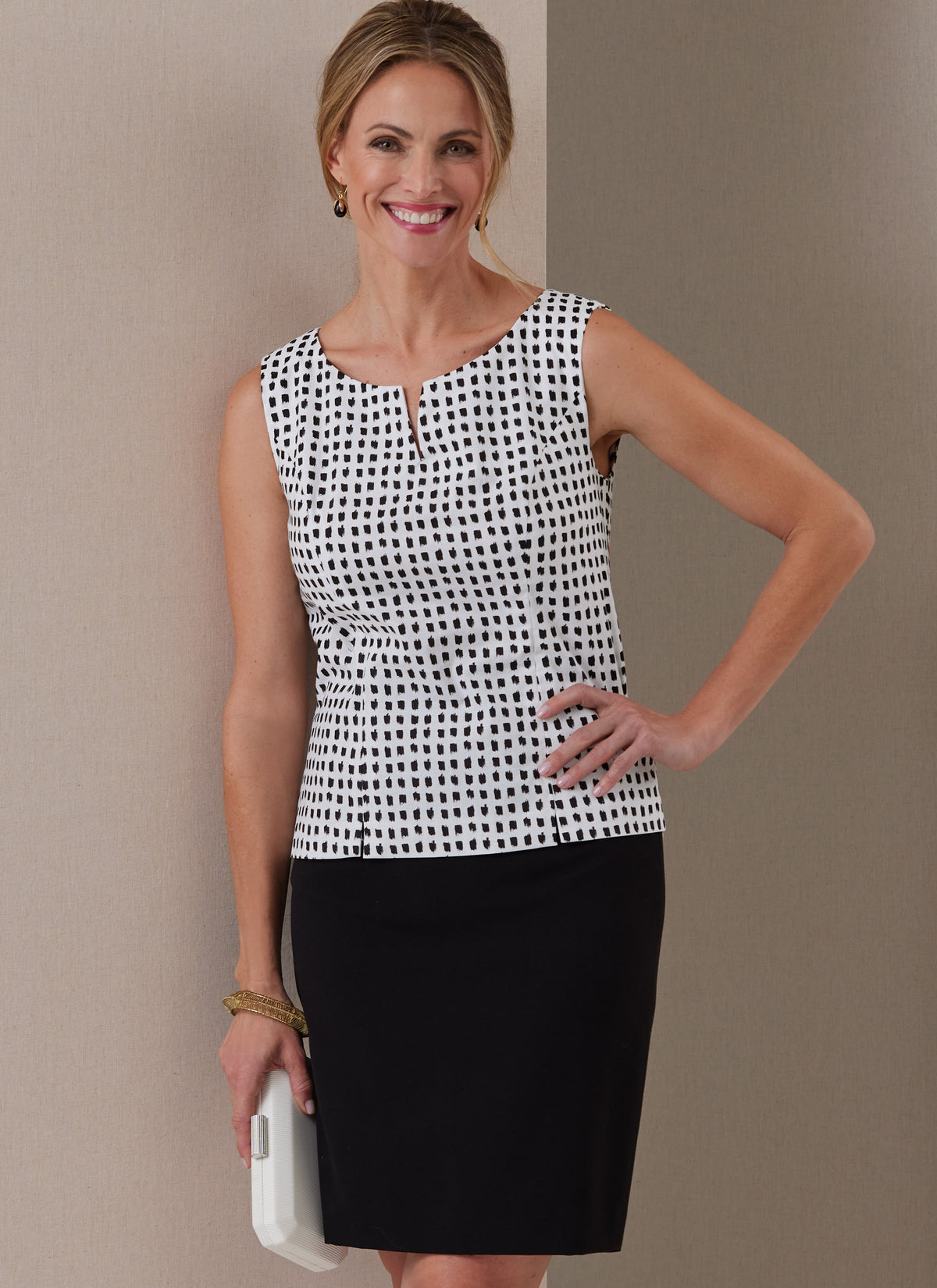 Butterick B6925 sewing pattern envelope showing the semi-fitted princess seam top designs